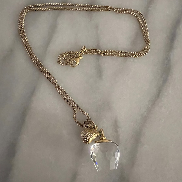 Signed Swarovski perfume atomizer necklace. 20” chain, charm is .75 “ in great condition.