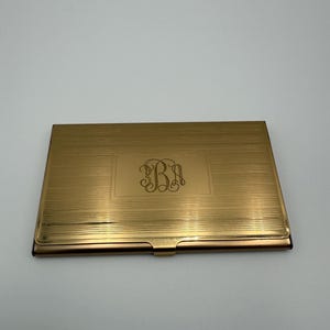 Vintage gold tone metal business card holder case with protective sleeve