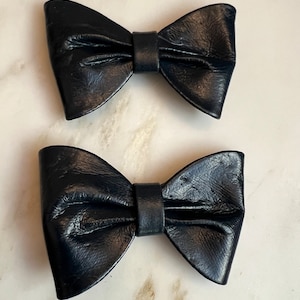 Vintage dark blue leather bow shoe clips