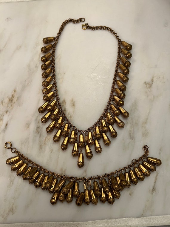 Vintage brass bib necklace and bracelet with textu