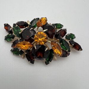 Vintage Judy Lee topaz and green rhinestone brooch