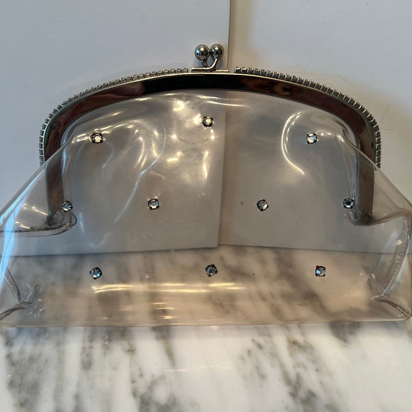 Vintage clear plastic clutch purse with rhinestone and rhinestone top