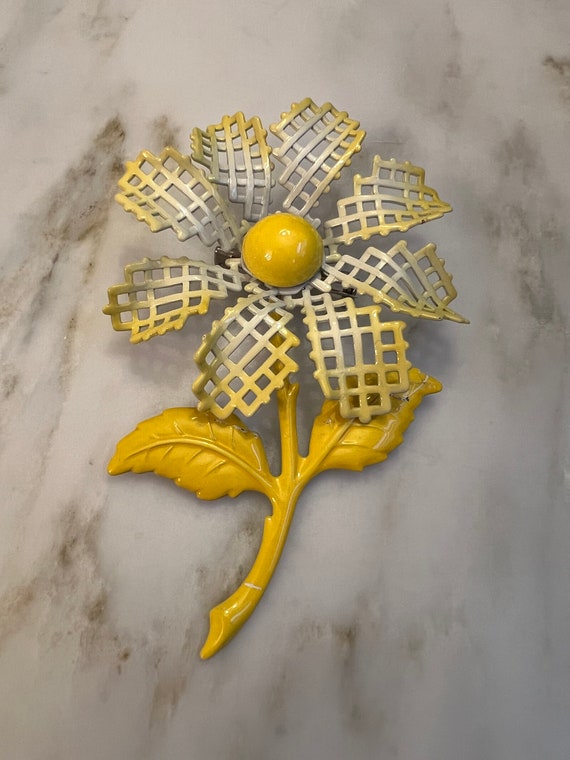 Vintage yellow and white enamel flower brooch