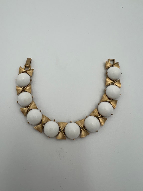 Vintage crown Trifari white lucite and bushed gold