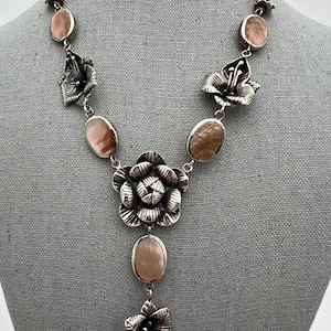 Sterling silver flowers necklace with pink mother of pearl accents