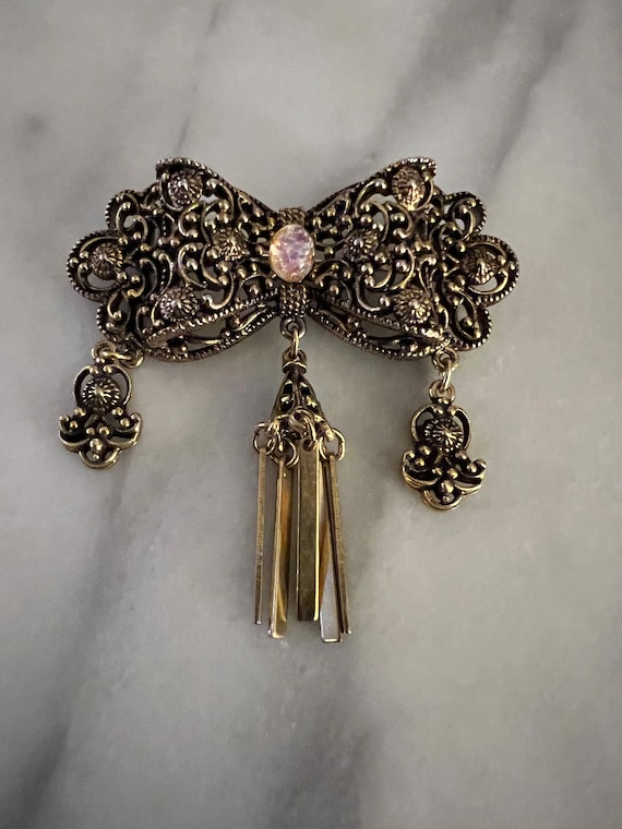 Vintage Weiss filigree tassel bow brooch with fau… - image 1