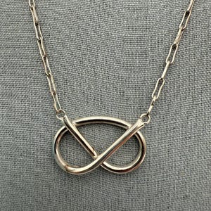 Vintage sterling silver love knot necklace