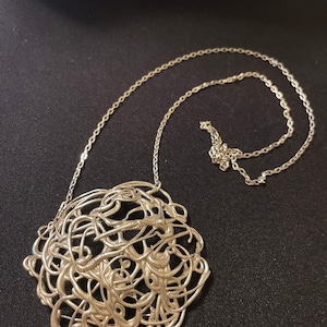 Vintage abstract silver metal crochet lace necklace