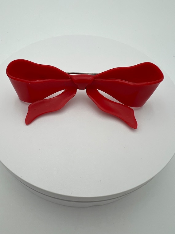 Vintage red plastic bow hair clip barrette made i… - image 1