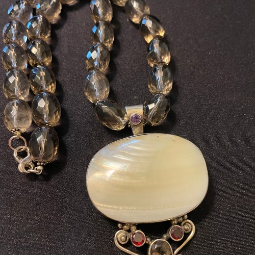 Sterling silver shops and natural mother of pearl shell pendant with faceted smoky crystal beaded necklace