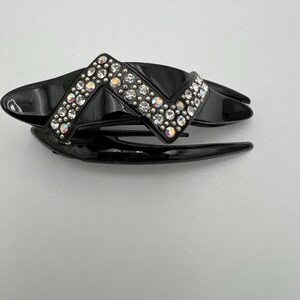 Vintage black plastic rhinestone hair clip barrette designed by France