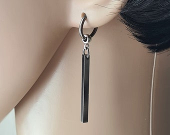 Un clip pour homme, une boucle d'oreille pendante pour homme, une boucle d'oreille longue pour homme