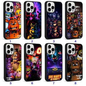 May include: A collection of eight black phone cases featuring colorful designs inspired by the video game "Five Nights at Freddy's." Each case showcases different characters and scenes from the game, with vibrant colors and detailed artwork.