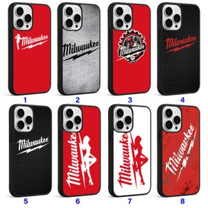 May include: A collection of eight phone cases with black borders and various designs. The cases feature the "Milwaukee" logo in white, red, and black, along with graphic elements. Some cases have a red background, while others have a textured or patterned design.
