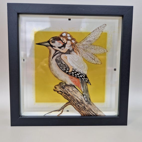 Hand Painted Glass Art: Fairy Embracing Woodpecker, Silver Stain Background