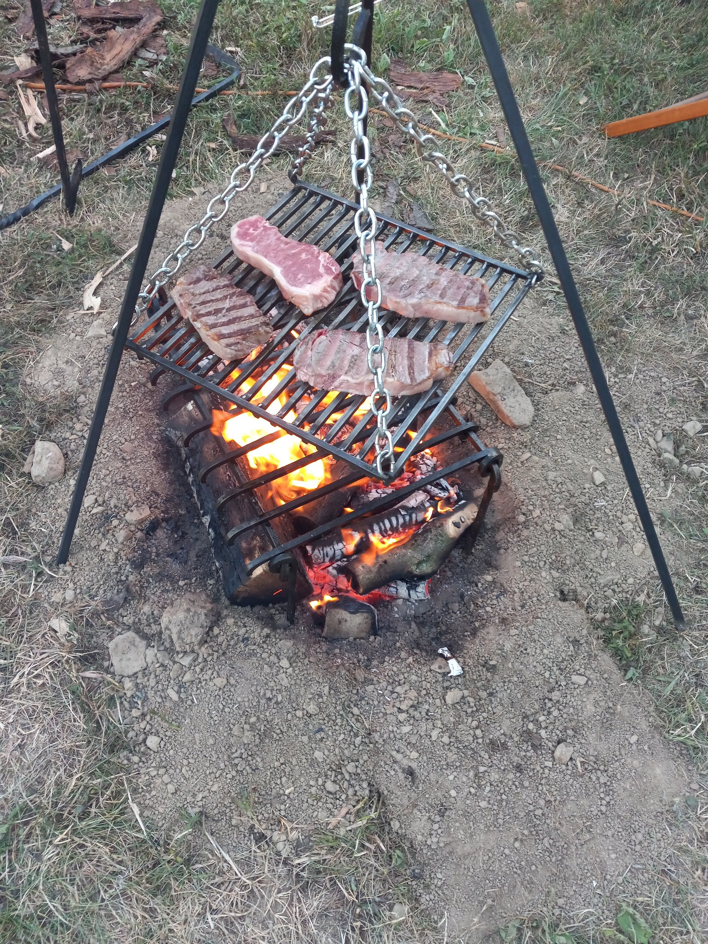 Hand forged campfire tripod.  Campfire, Fire pit grill, Blacksmithing