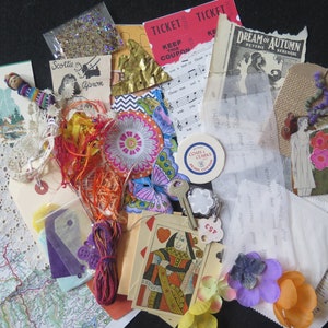 May include: A collection of vintage ephemera, including playing cards, tickets, tags, lace, and decorative paper elements. The color palette includes reds, oranges, purples, and gold, with a map and a doll. Ideal for scrapbooking and mixed media projects.