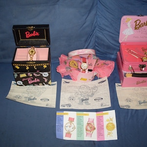 Barbie Fossil watch Collectors Series. 3 untouched watches still in the original box with certificate. These are 30 years old and in style.