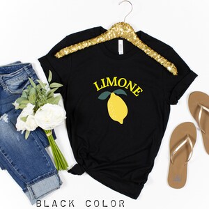 May include: Black t-shirt with a yellow lemon graphic and the word "LIMONE" in yellow text.