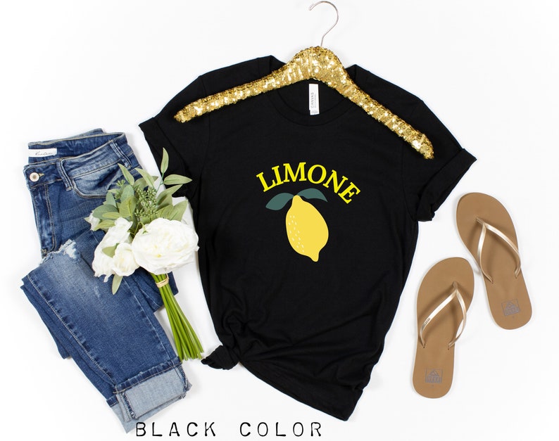 May include: Black t-shirt with a yellow lemon graphic and the word "LIMONE" in yellow text.
