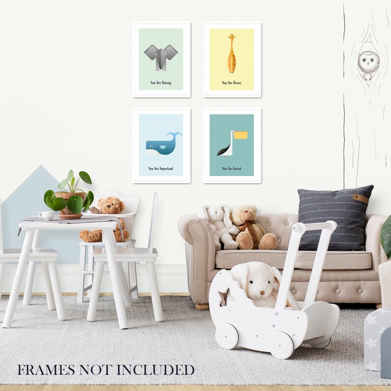 May include: Four framed prints with colorful animal illustrations and positive affirmations. The prints feature a blue whale, a grey elephant, a yellow giraffe, and a blue and orange toucan. The text on the prints reads "You are important", "You are strong", "You are brave", and "You are loved".