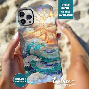 May include: A phone case featuring a stained-glass design of a sun and ocean waves in shades of blue, teal, and gold. The case has the text "Essence creations by KG" and "MAGSAFE® AVAILABLE" and "OTHER PHONE STYLES AVAILABLE".