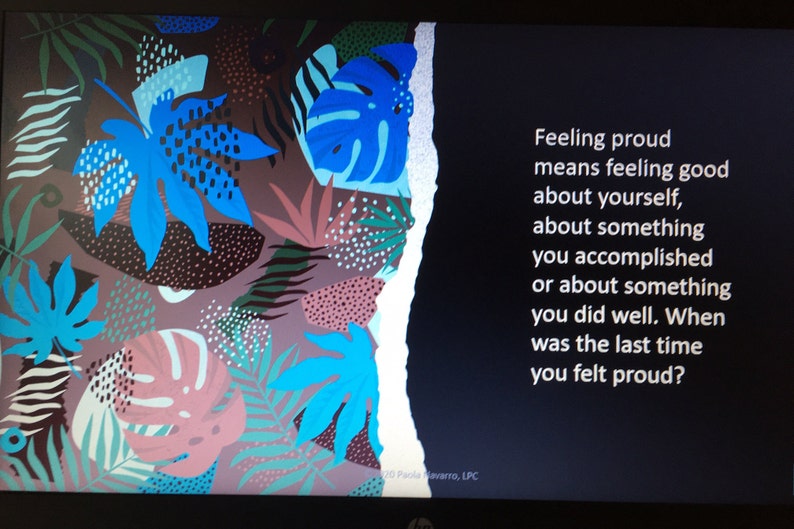 May include: A motivational quote on a black background with a tropical leaf design on the left side. The quote reads: "Feeling proud means feeling good about yourself, about something you accomplished or about something you did well. When was the last time you felt proud?"