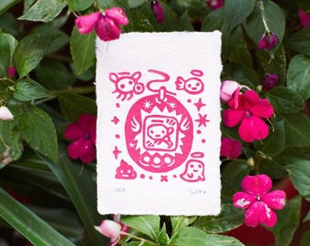 Tamagotchi Angel Linoprint: Y2K Nostalgia Art, Handmade Paper