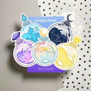 May include: Four colourful glass bottles with cork stoppers and celestial designs. Each bottle contains a different coloured liquid and celestial elements. The bottles are labelled "Elemental Potions" and "Doozy Doodle".