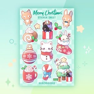 Puede incluir: Una hoja de pegatinas con temática navideña con adorables animales de dibujos animados, adornos y golosinas festivas. La hoja incluye un gato con una bufanda, un conejito en una media, un muñeco de nieve, un bastón de caramelo, un árbol de Navidad y una taza de chocolate caliente. El texto "Merry Christmas Sticker Sheet" y "DoozyDoodle" están incluidos en la hoja.
