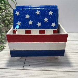 Red, white, and blue ceramic coaster