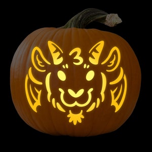 May include: A carved pumpkin with a lit-up design of a cartoon goat with the number "3" above it.