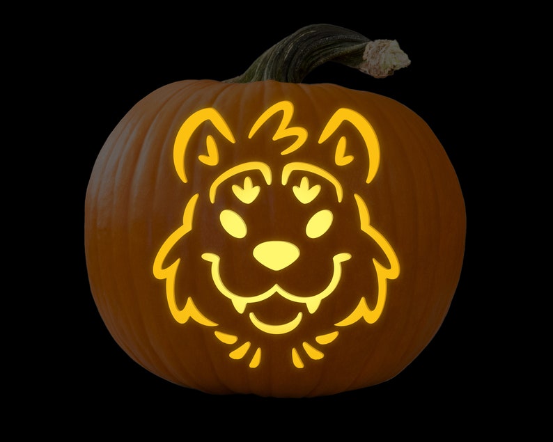 May include: A carved pumpkin with a cute cartoon wolf face illuminated from inside. The wolf has a friendly expression with big eyes and a wide smile.