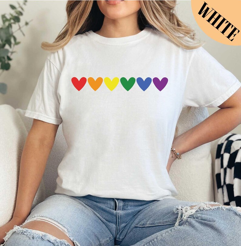 a poster with different colors and sizes of shirts