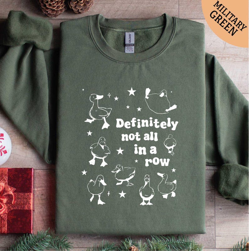 a green t - shirt that says definitely not all in a row