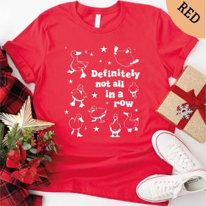a red t - shirt that says definitely not all in a row