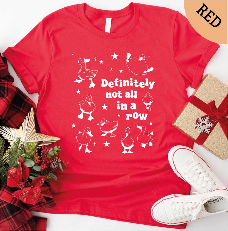 a red t - shirt that says definitely not all in a row