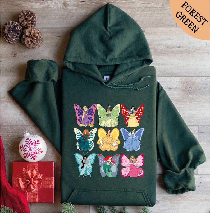 a green hoodie with a bunch of butterflies on it
