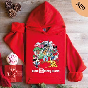 a red hoodie with a cartoon character on it