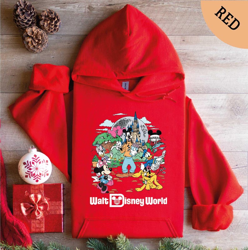 a red hoodie with a cartoon character on it