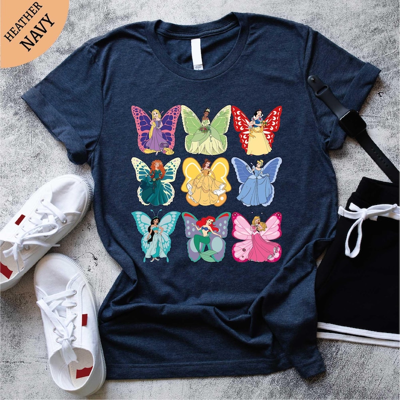 a t - shirt with a bunch of butterflies on it
