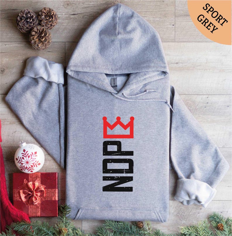 a gray hoodie with a crown on it