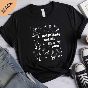 a t - shirt that says definitely not all in a row
