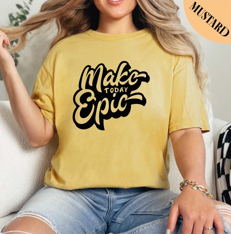a woman sitting on a couch wearing a yellow shirt