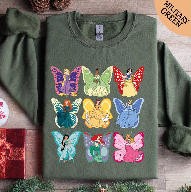a green shirt with disney characters on it