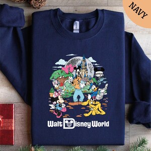 a blue shirt with a cartoon character on it