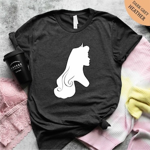 a black shirt with a white silhouette of a woman's head