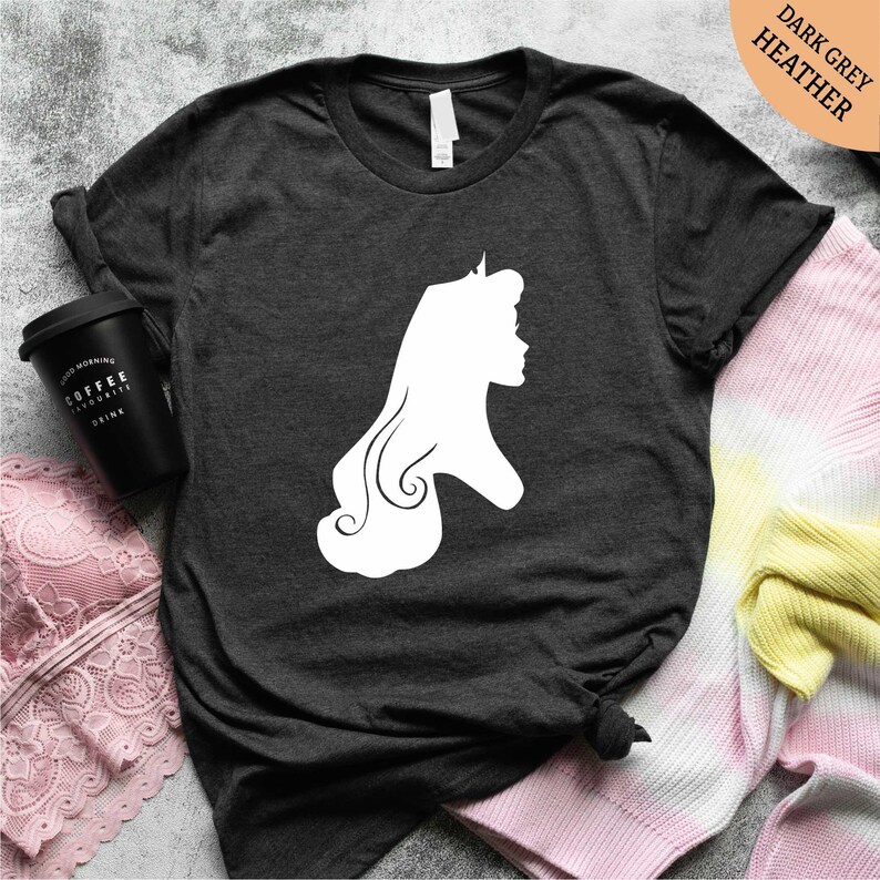 a black shirt with a white silhouette of a woman's head