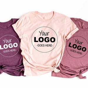 a group of t - shirts with different logos on them