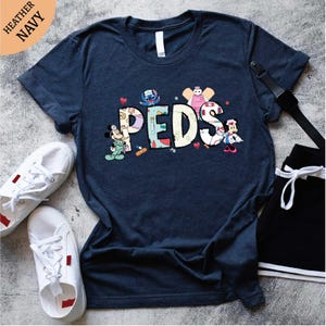a t - shirt with the word peds printed on it